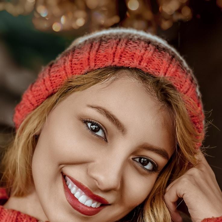 Avery Chen, Lead Design Curator at PrairieBytePark, reviewing corporate floral arrangements